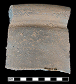 North Devon gravel tempered earthenware pan. Glazed interior and unglazed exterior. Approximately 13” rim diameter. 